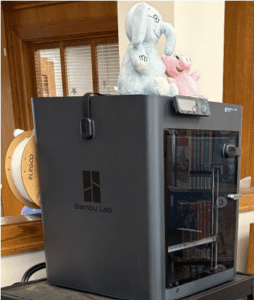 Glencoe Public Library's 3D printer #2, located next to the Children's desk on the second floor